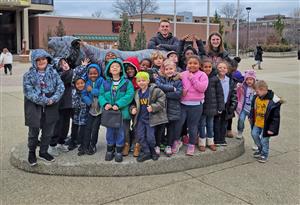 group of students pose outside of Buffalo State University